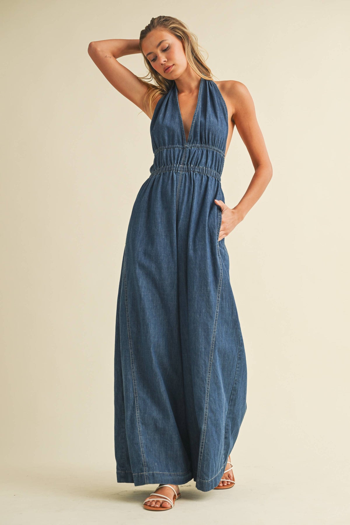 DENIM HALTER  WIDE LEG JUMPSUIT
