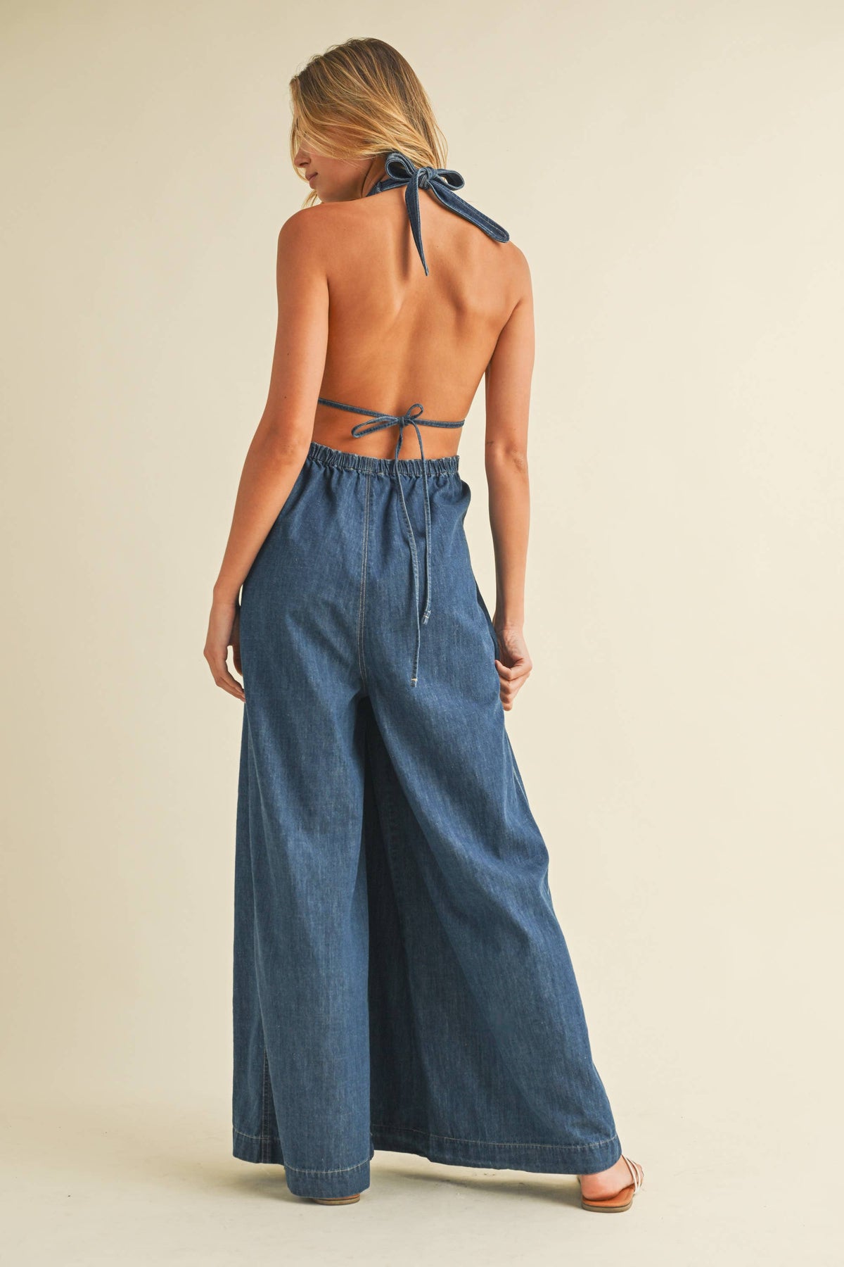 DENIM HALTER  WIDE LEG JUMPSUIT