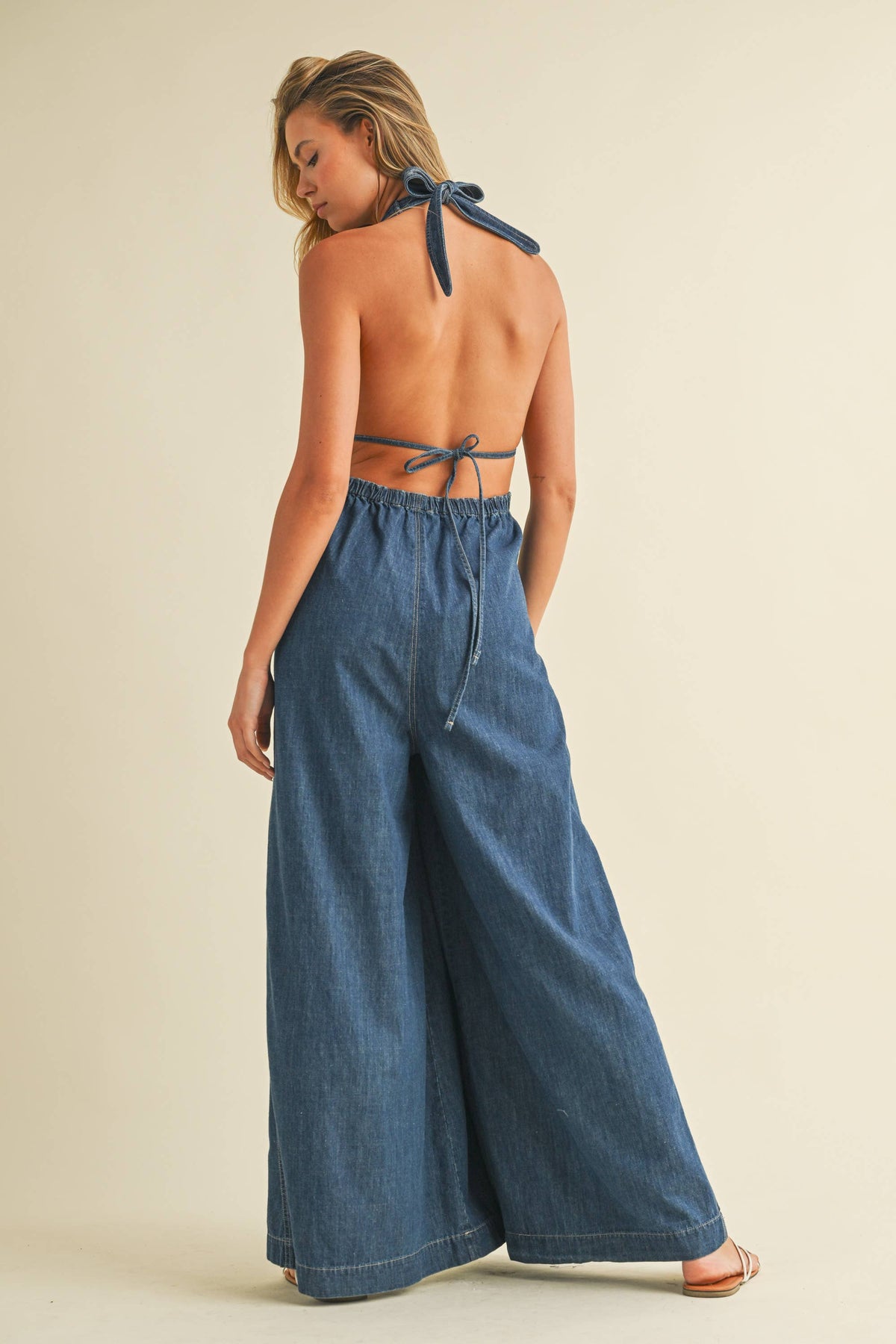 DENIM HALTER  WIDE LEG JUMPSUIT